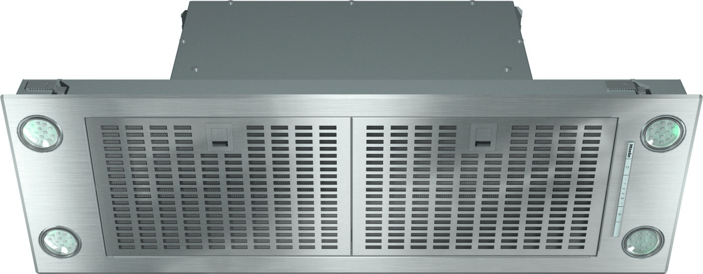 Industrial stainless steel range hood with two large vent panels and round lights at each corner.
