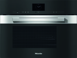 Front view of a black Miele built-in oven with a stainless steel handle and control panel showing a clock display
