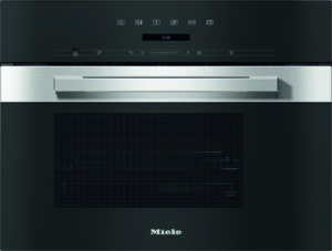 Built-in black Miele oven with a brushed stainless steel handle and control panel above the door.