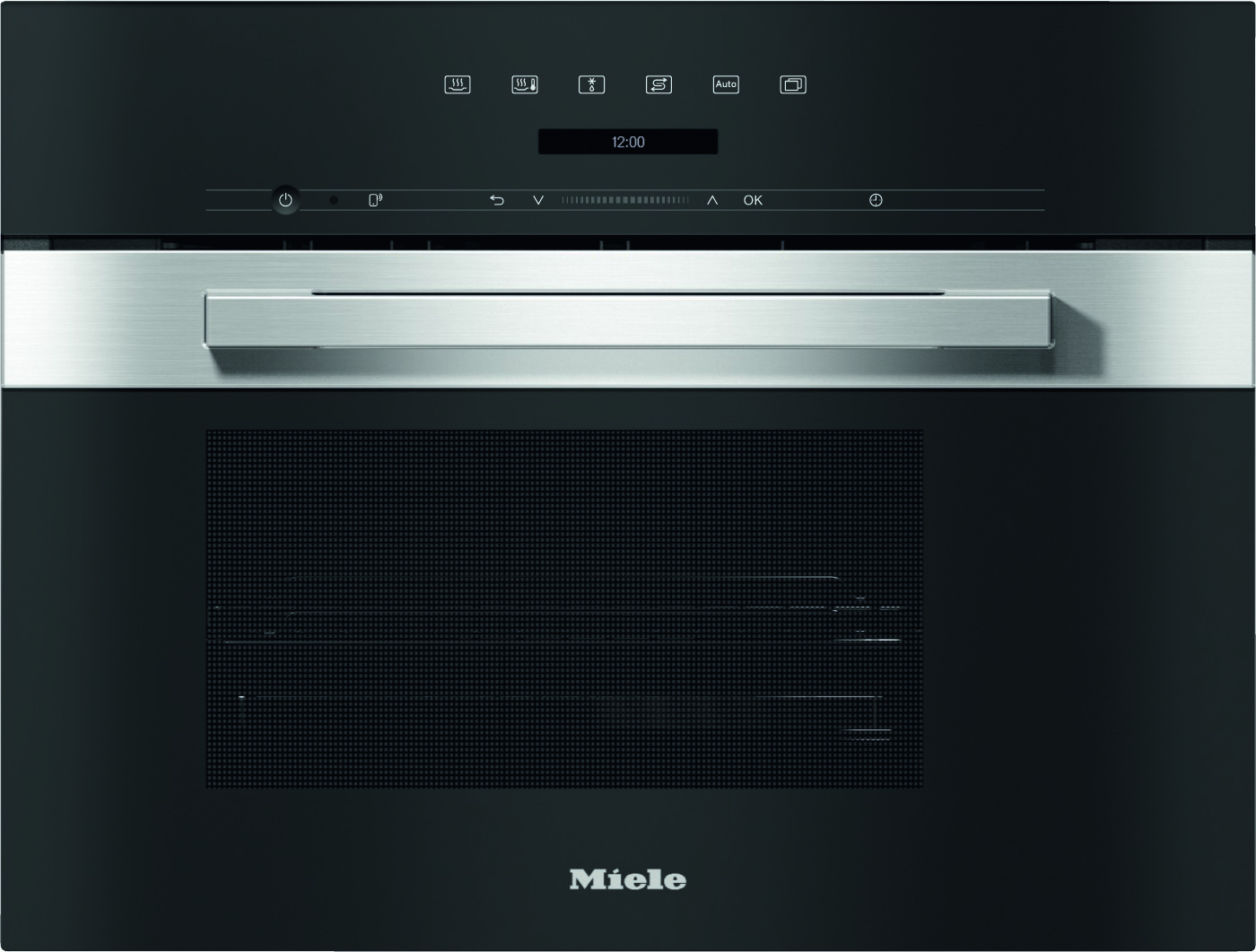 Built-in black Miele oven with a brushed stainless steel handle and control panel above the door.