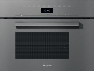 Front view of a stainless steel Miele oven with a long horizontal handle and a digital clock reading 12:00.