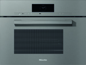 Stainless steel Miele wall oven with a central black touchscreen clock display and metal handle above a vented panel.