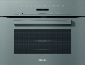 Front view of a silver Miele oven with a long handle and a row of control icons above a digital display.