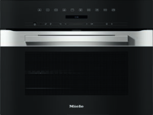 Built-in Miele oven with a stainless steel handle and black control panel.