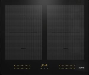 Two-zone Miele induction cooktop with dotted burner patterns and a central timer showing 0:10, gold control labels along the bottom edge.