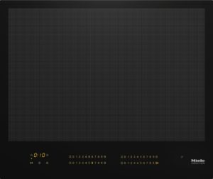 Miele induction cooktop with black glass surface and gold control panel at the bottom edge of the unit.