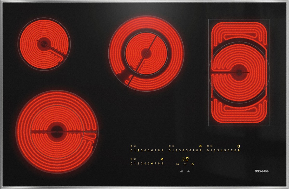 Electric coil stovetop with four glowing red burners on a black glass surface (Miele).