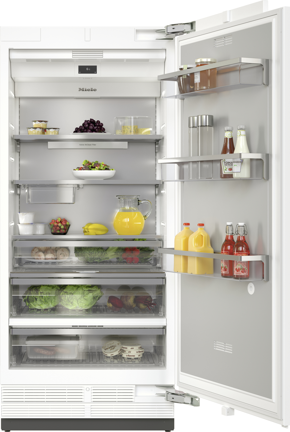 Open refrigerator showing shelves with fruits, vegetables, dairy, juice, and condiments; bottles on the door shelf.