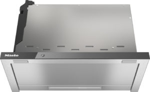 Stainless steel Miele range hood with a dark front panel and a built-in vent at the bottom, viewed from the front-top angle.