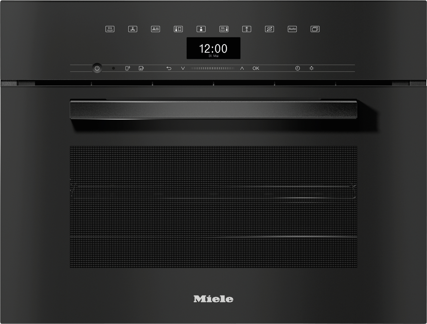 Front view of a black Miele oven with a slim control panel on top, a digital clock reading 12:00, and a large textured vent below the handle