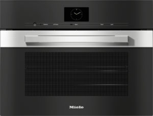 Miele built-in oven with black control panel and brushed stainless-steel handle above a textured vent area.