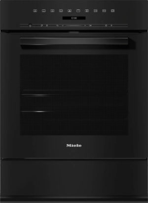 Black Miele oven with a digital clock, touch control panel and metal handle above a bottom storage drawer; sleek built-in kitchen appliance.