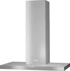 Stainless steel chimney kitchen hood mounted above a flat countertop, with control panel on the front and the Miele logo visible near the base