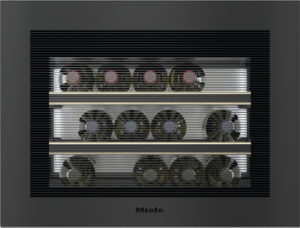 Front view of a Miele built-in oven showing multiple cooling fans behind horizontal vents on three shelves.
