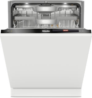 Open Miele dishwasher with racks and silver interior, front control panel visible
