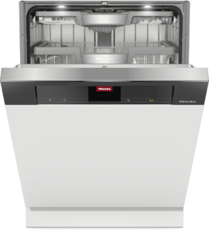 Fully open Miele dishwasher showing interior racks and detergent area, ready for loading dishes (front panel visible).
