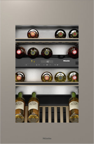 Miele wine fridge interior with rows of bottles on metal racks and a digital display panel