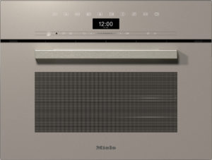 Modern Miele built-in oven with a metal handle, digital clock displaying 12:00 and a row of control icons above the door.