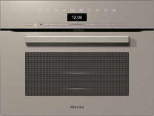 Brushed metal Miele oven front with a long horizontal handle, a large glass door with a dotted pattern, and a digital clock reading 12:00.