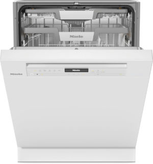 Open Miele dishwasher with the upper rack visible and control panel on the front