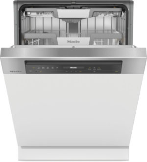 Miele dishwasher with door open, showing interior racks and spray arms in a stainless steel interior