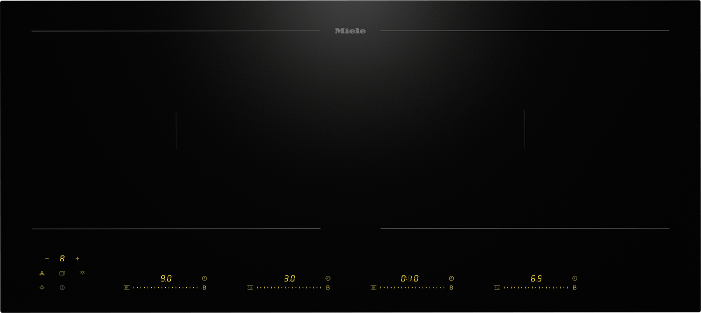 Miele induction cooktop control panel in dark, with two cooking zones marked by thin lines and yellow digital readouts along the bottom edge.