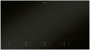 Miele glass-ceramic cooktop with touch controls along the bottom edge, dark surface and minimal branding at top center