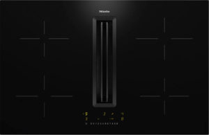 Miele black glass cooktop with a central vent and yellow digital control panel.