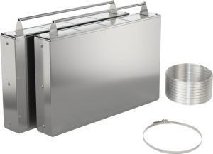 Stainless steel industrial cabinet with top rails and a coil of metal strap beside it