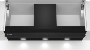 Overhead view of a sleek black Siemens kitchen range hood with integrated LED lights under the hood and a touch panel on the front edge.