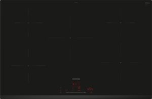 Black glass-ceramic induction cooktop with subtle zone outlines and a red LED timer display, Siemens branding visible.