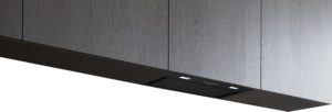 Under-cabinet black range hood with a rectangular control panel along the front edge under gray wood cabinets.