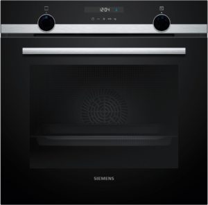 Siemens built-in oven front with two round control knobs, a brushed metal handle, and the Siemens logo at the bottom left.