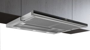 Ceiling-mounted stainless steel range hood with built-in lights and a Siemens control panel visible from below.