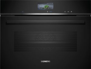 Black Siemens kitchen appliance (oven) front view with a small display showing a broccoli florets recipe and control icons; Siemens logo below.