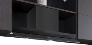 Modern black wall-mounted range hood integrated into dark wood cabinetry, Siemens logo visible on the front panel.