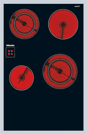 Electric cooktop with four red coil burners on a dark surface, brand name Miele visible on the left panel.