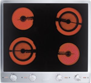 Electric stovetop with four glowing red coil burners (two small, two large) on black surface and metal frame.