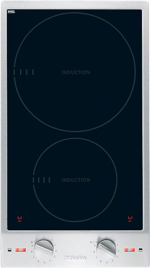 Two-burner induction cooktop with circular heating zones and metal frame, control knobs at the bottom.