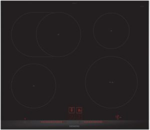 Induction cooktop surface with several circular heating zones and red digital controls at the bottom center, Siemens logo visible