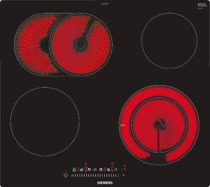 Siemens induction cooktop with two large circular burners; red heat patterns fill the left burner area on a black surface.