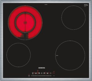 Induction cooktop with a red-hot left burner and an idle right burner on a black surface, Siemens branding visible at the bottom.