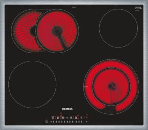 Induction cooktop with red glowing heating zones on the left, Siemens branding at bottom.