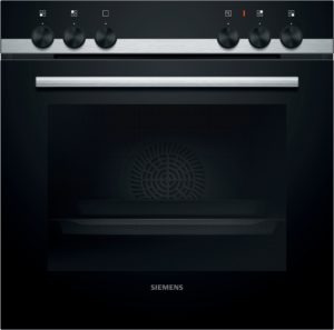 Front view of a Siemens built-in oven with six control knobs on a dark panel and a brushed stainless steel handle.