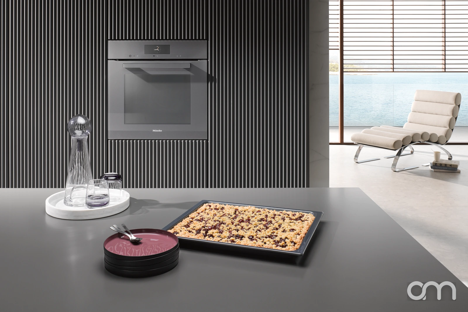 Four encastrable Miele H 7860-60 BP intégré dans une colonne de cuisine, installé par Arts & Ménagers dans le canton de Neuchâtel