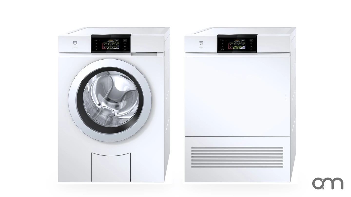 Lave-linge V-ZUG AdoraLavage V6000 et sèche-linge AdoraSéchage V6000 côte à côte, configuration de buanderie installée par Arts & Ménagers dans le canton de Neuchâtel