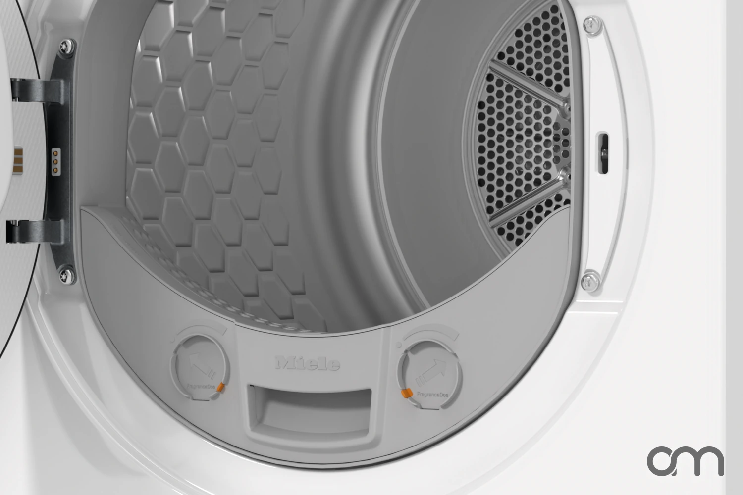 Filtre à peluches et tambour d'un sèche-linge à pompe à chaleur Miele, porte ouverte