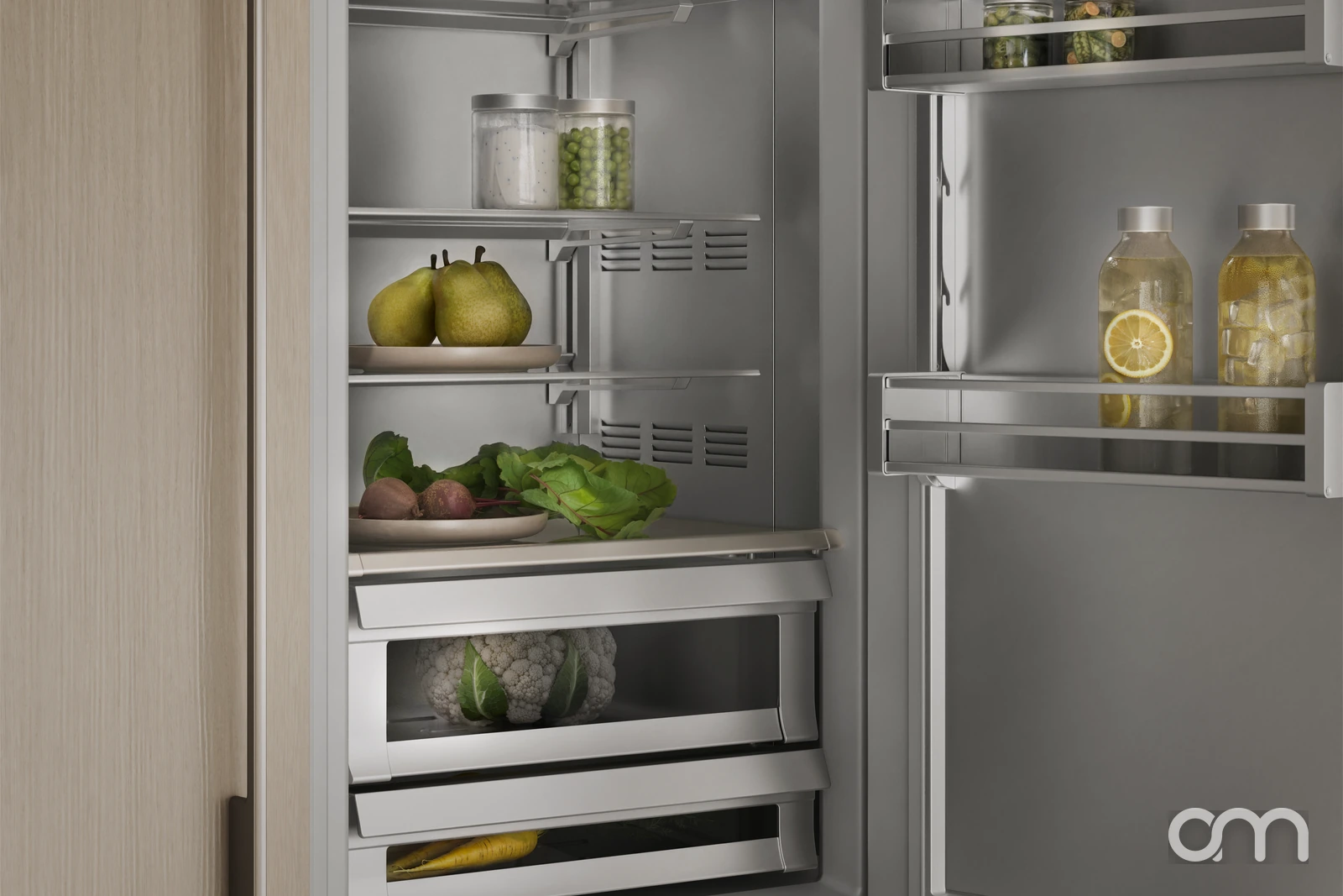 Intérieur de réfrigérateur V-ZUG avec clayettes et tiroirs à légumes, idéal pour décongeler viandes et poissons en douceur, cuisine du canton de Neuchâtel